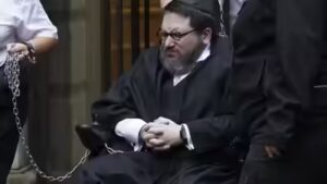 US convicted rapist who faked his death and fled to Scotland to avoid arrest dies in prison hospital