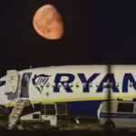 Passenger partially sucked through window after Ryanair flight suffers mid-air emergency – video