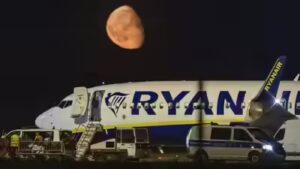 Passenger partially sucked through window after Ryanair flight suffers mid-air emergency – video