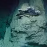Scientists drilled 1.3 km beneath the Atlantic and found superheated water that may fuel one of Earth’s strangest sunless ecosystems