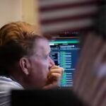 US stock market today: Wall Street sees mixed performance; Dow rises 0.3%, Nasdaq falls 0.8% as AI stocks slide